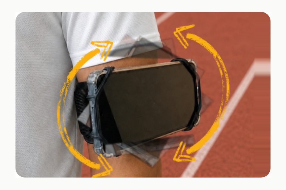 A landscape phone holder worn on an arm above a red track, with yellow arrows illustrating rotation.